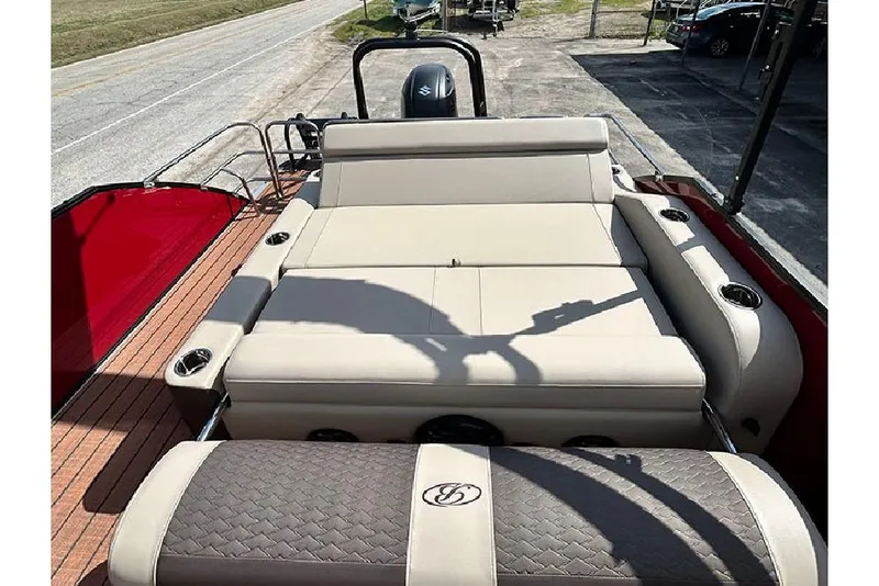 Slide: The Image of 2026 Bentley Pontoons 223 Elite Swingback DC with luxurious seating and sleek design. - 22