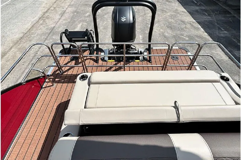 Slide: The Image of 2026 Bentley Pontoons 223 Elite Swingback DC with sleek deck and seating. - 24