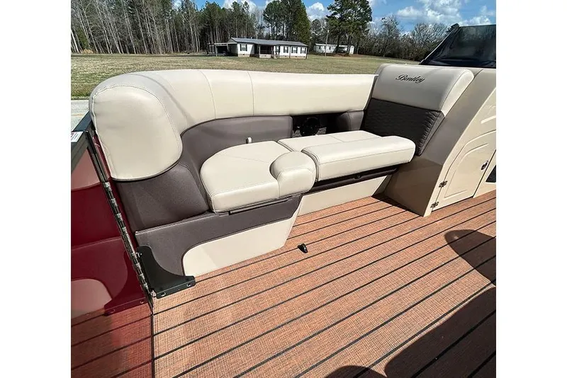 Slide: The Image of 2026 Bentley Pontoons 223 Elite Swingback DC interior seating with luxurious beige upholstery. - 27