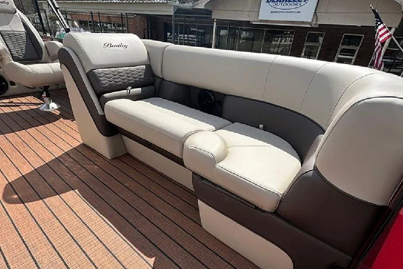 Slide: The Image of 2026 Bentley Pontoons 223 Elite Swingback DC interior with luxurious seating and elegant design. - 28