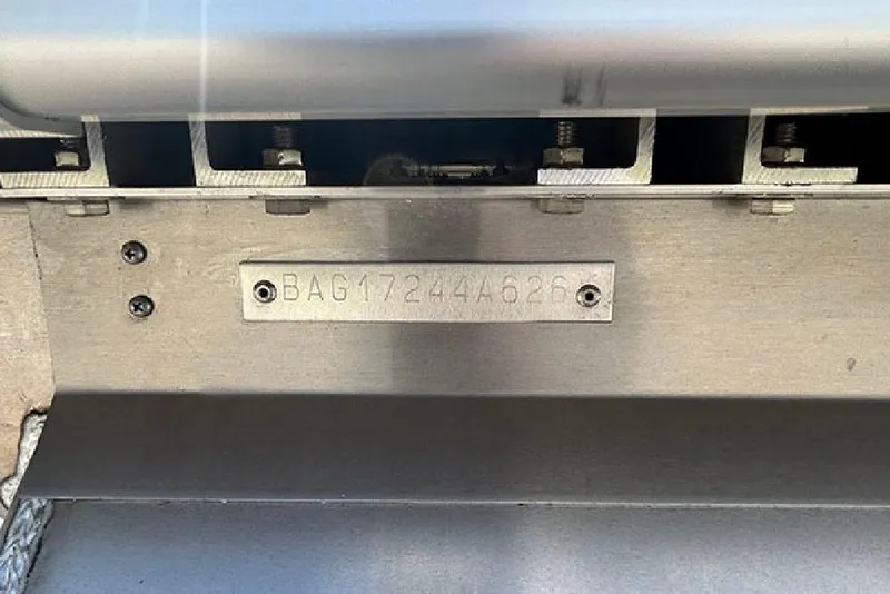 Slide: The Image of 2026 Bentley Pontoons 223 Elite Swingback DC hull identification number plate. - 29