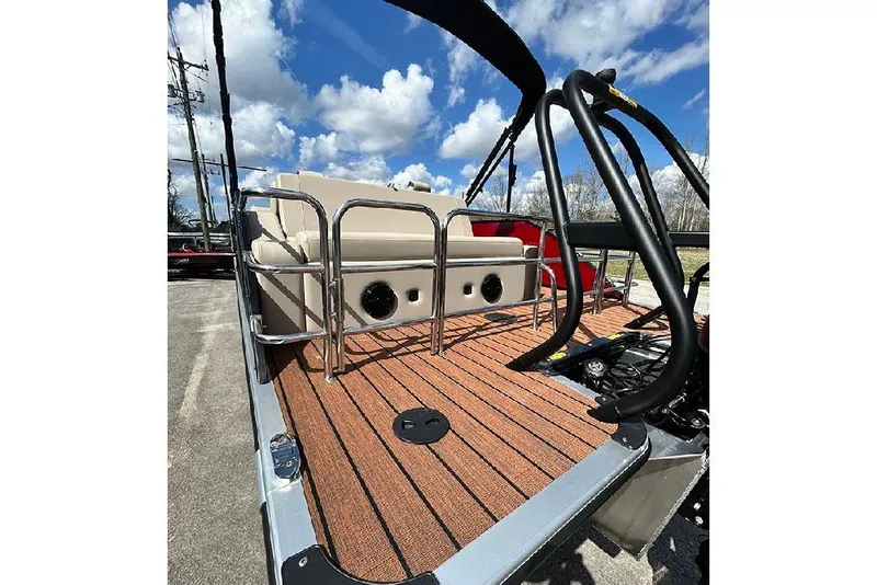 Slide: The Image of 2026 Bentley Pontoons 223 Elite Swingback DC with teak deck and stainless steel railings. - 6
