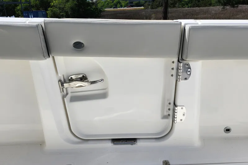 Slide: The Image of 2026 Pursuit S 388 Sport boat door with stainless steel latch and hinges. - 24