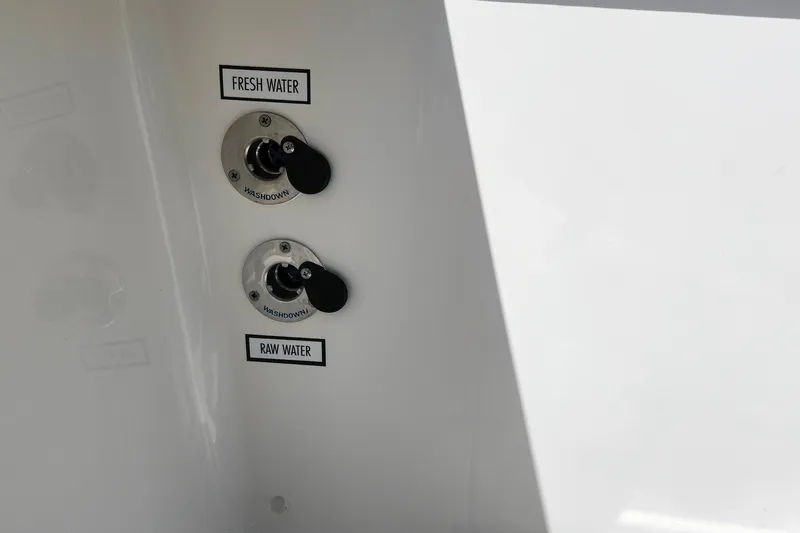 Slide: The Image of Fresh and raw water washdown valves on 2026 Pursuit S 388 Sport boat. - 25