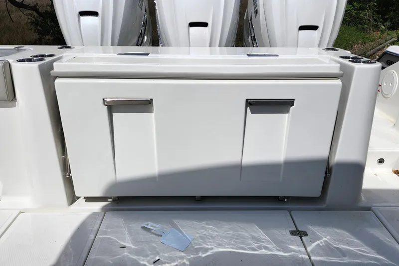 Slide: The Image of 2026 Pursuit S 388 Sport boat with sleek white storage compartment. - 29