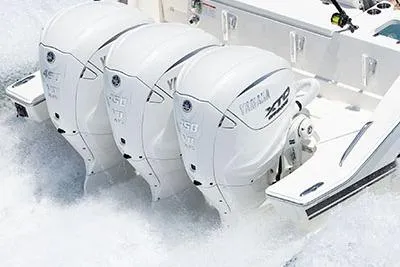 Slide: The Image of 2026 Pursuit S 388 Sport boat with triple Yamaha outboard engines in action. - 49