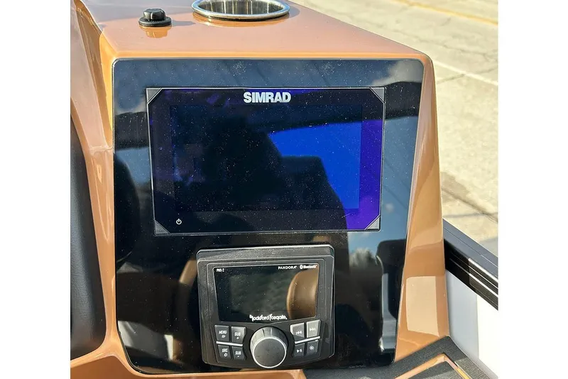 Slide: The Image of Simrad display and Rockford Fosgate control on 2026 Bentley Pontoons Elite 223 Admiral. - 14