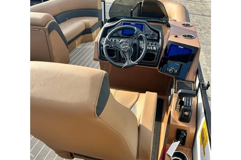 Slide: The Image of 2026 Bentley Pontoons Elite 223 Admiral interior with luxurious seating and advanced controls. - 16