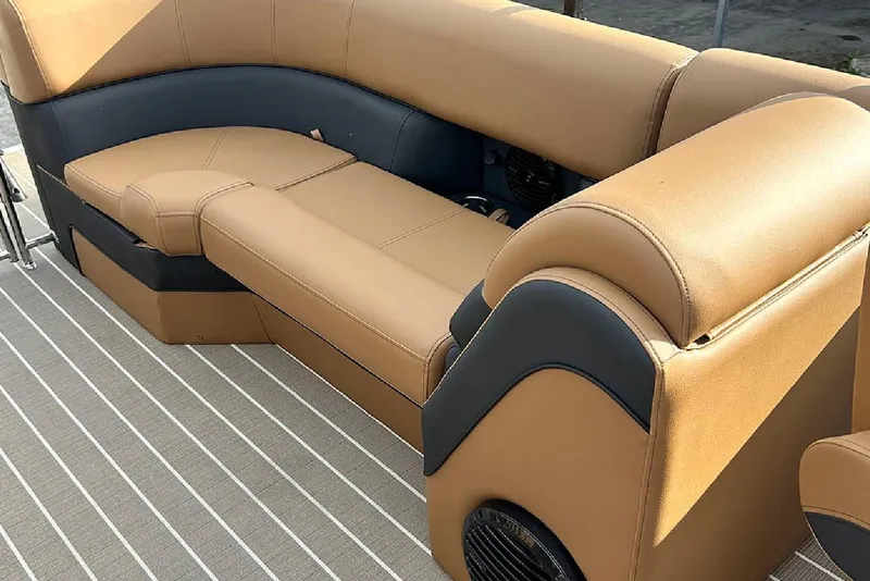 Slide: The Image of 2026 Bentley Pontoons Elite 223 Admiral interior with tan and black seating. - 17