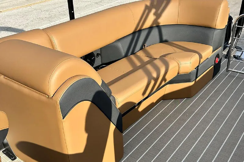 Slide: The Image of 2026 Bentley Pontoons Elite 223 Admiral, luxurious tan seating on striped deck. - 18