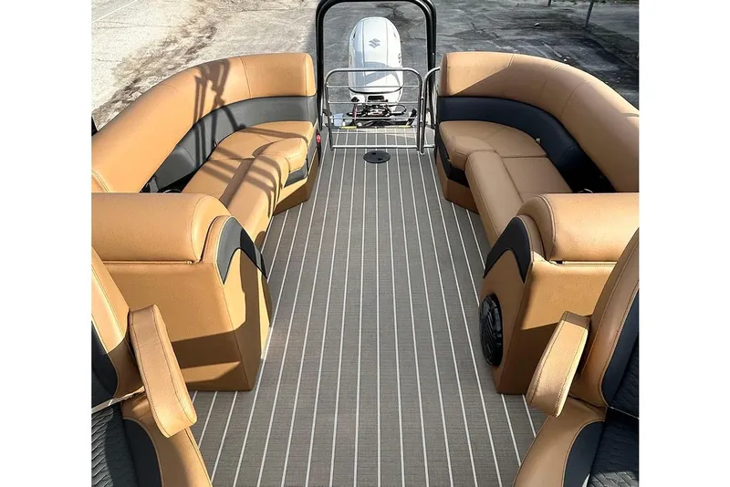 Slide: The Image of 2026 Bentley Pontoons Elite 223 Admiral with luxurious tan seating and spacious deck layout. - 19