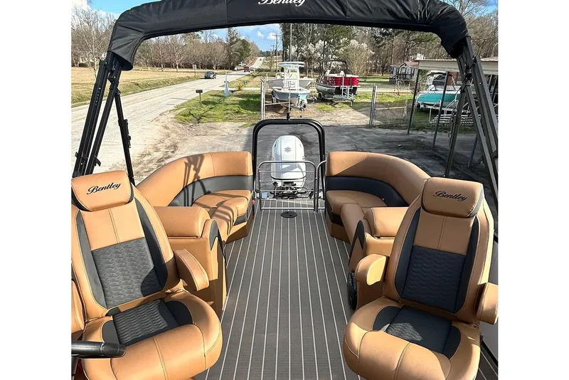 Slide: The Image of 2026 Bentley Pontoons Elite 223 Admiral interior with luxurious seating and sleek design. - 20