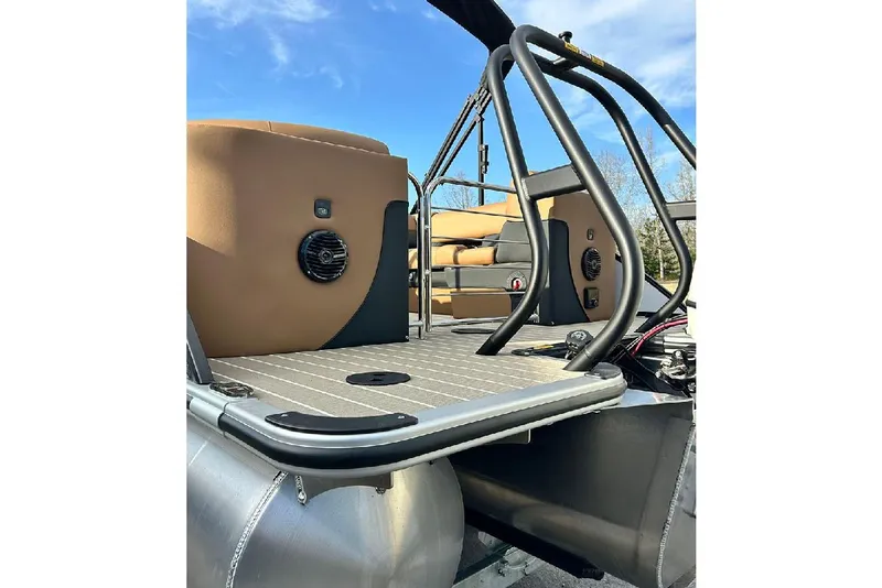 Slide: The Image of 2026 Bentley Pontoons Elite 223 Admiral, rear deck view with seating and railings. - 21