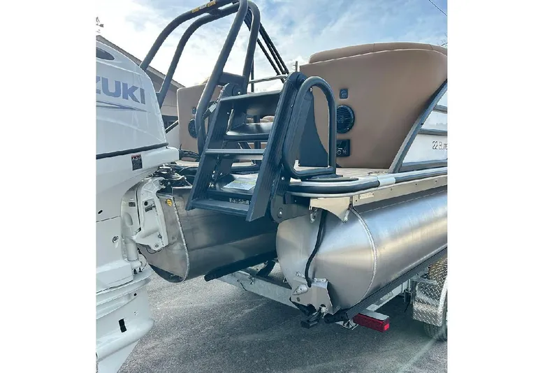 Slide: The Image of 2026 Bentley Pontoons Elite 223 Admiral with Suzuki engine, rear view showing ladder and pontoons. - 22