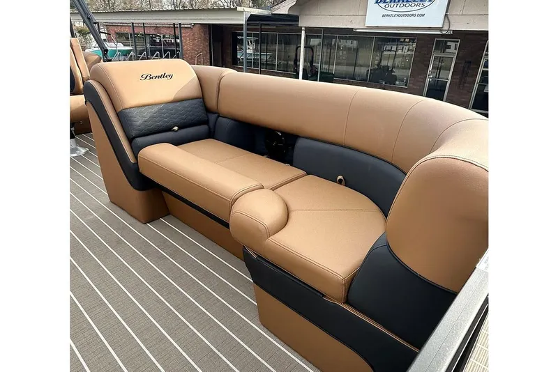 Slide: The Image of Luxurious seating on 2026 Bentley Pontoons Elite 223 Admiral, featuring tan and black upholstery. - 8