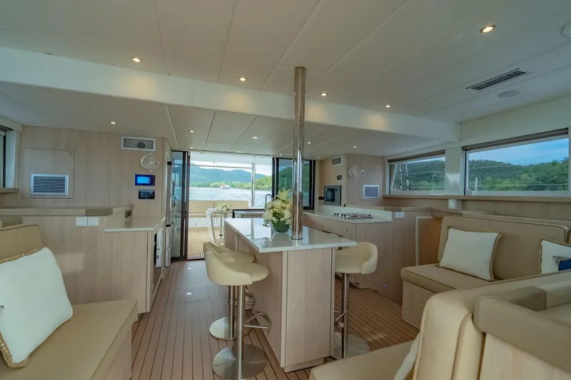 Slide: The Image of Luxurious interior of 2026 Island Spirit 525E yacht with modern furnishings and scenic views. - 25