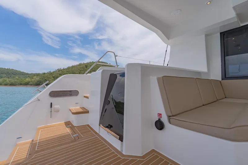 Slide: The Image of Luxurious Island Spirit 525E yacht deck with seating, 2026 model, scenic ocean view. - 28
