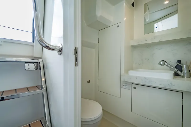Slide: The Image of Modern bathroom interior on 2026 Island Spirit 525E yacht, featuring sleek design and fixtures. - 31