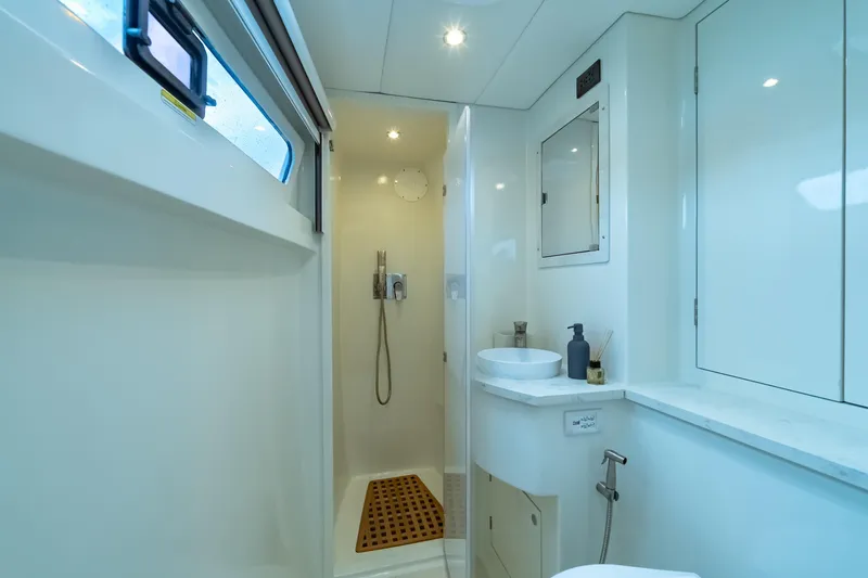 Slide: The Image of Luxurious bathroom interior of 2026 Island Spirit 525E yacht, featuring modern fixtures and elegant design. - 36