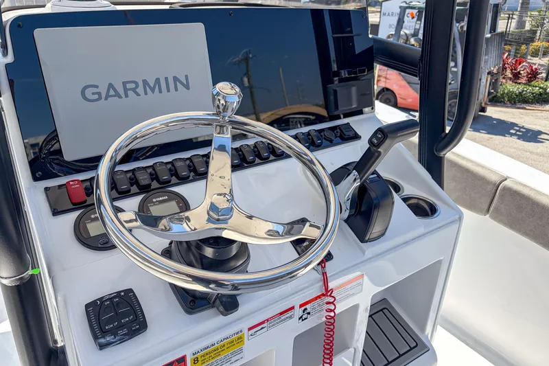 Slide: The Image of Helm of Sea Hunt Ultra 219 boat, model year 2026. - 7