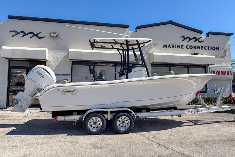 Slide: The Image of 2026 Sea Hunt Ultra 219 boat on trailer at Marine Connection. - 1