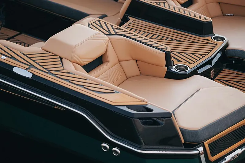 Slide: The Image of Manufacturer Provided Image: Luxurious interior of 2025 MasterCraft XStar 23 boat with tan leather seating. - 13