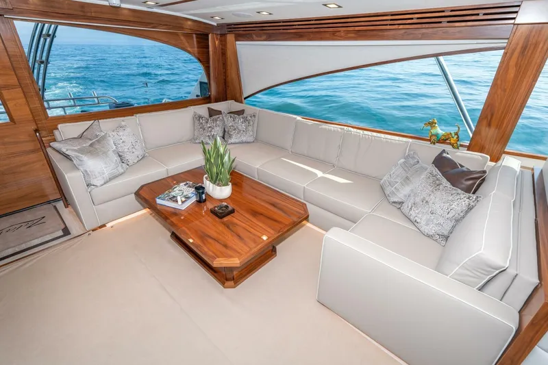 Slide: The Image of Luxurious interior of 2025 Viking 90 Convertible yacht with ocean view. - 19