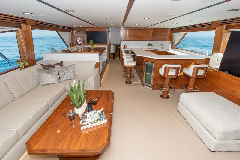 Slide: The Image of Luxurious interior of 2025 Viking 90 Convertible yacht with elegant seating and modern amenities. - 30