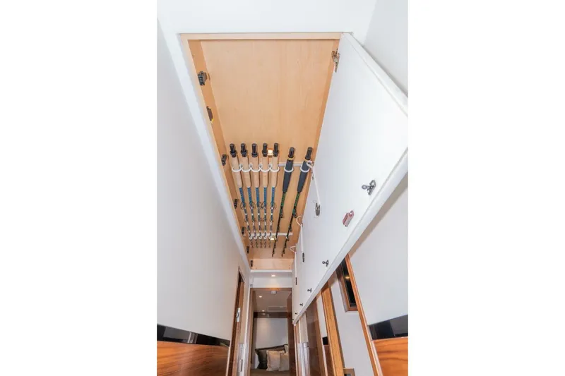Slide: The Image of Fishing rod storage in 2025 Viking 90 Convertible yacht interior. - 62