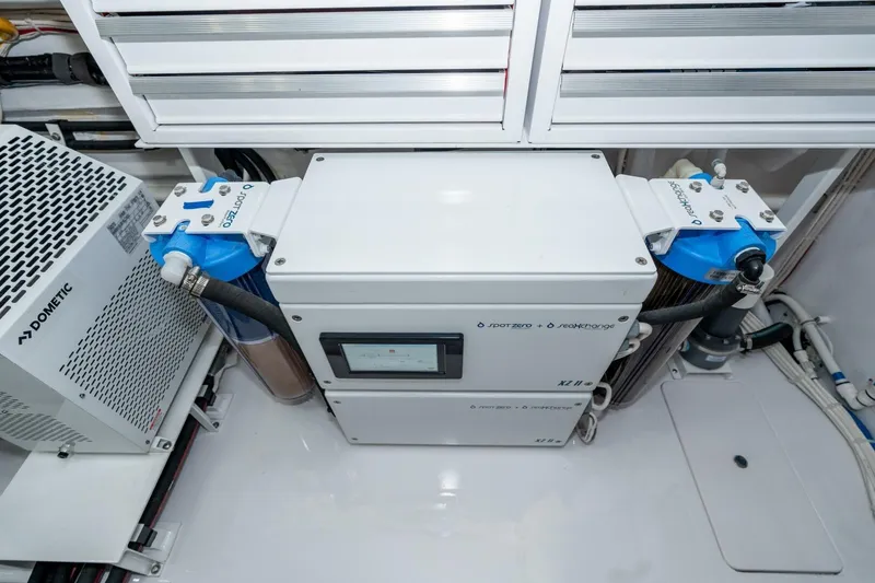 Slide: The Image of Engine room of 2025 Viking 90 Convertible yacht with advanced filtration system. - 72