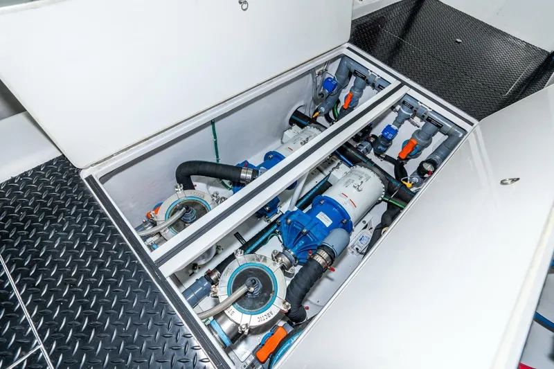 Slide: The Image of Engine room of 2025 Viking 90 Convertible yacht, showcasing advanced mechanical systems. - 86