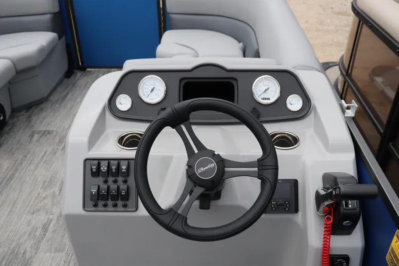 Slide: The Image of 2026 Bentley Pontoons 160 Cruise dashboard with steering wheel and control panel. - 5
