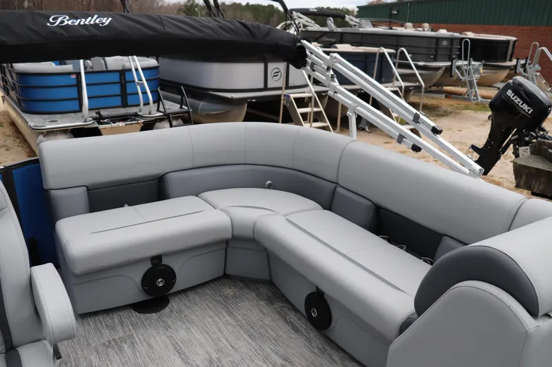 Slide: The Image of 2026 Bentley Pontoons 160 Cruise with luxurious seating and modern design. - 6