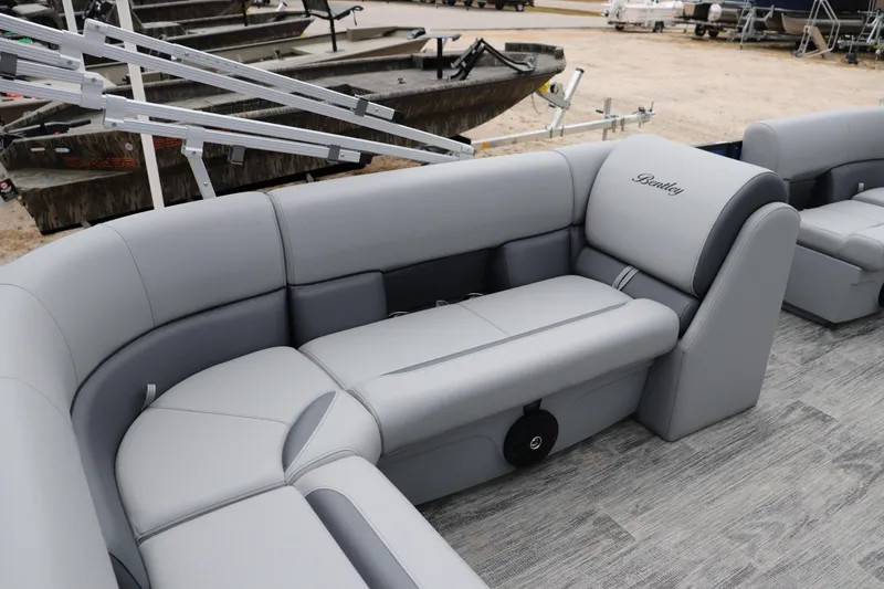 Slide: The Image of 2026 Bentley Pontoons 160 Cruise interior with luxurious gray seating and modern design. - 7