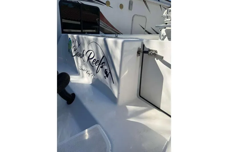 Slide: The Image of 2022 Contender 35 ST boat with "Bank Reefs" logo, Duck Key, FL. - 25