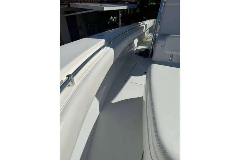 Slide: The Image of 2022 Contender 35 ST boat interior with white seating and sleek design. - 34