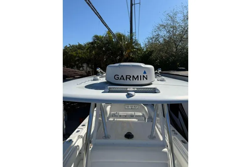 Slide: The Image of 2022 Contender 35 ST boat with Garmin radar, clear sky background. - 39