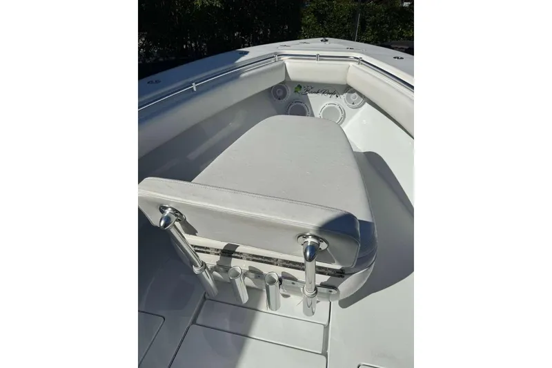 Slide: The Image of 2022 Contender 35 ST boat interior with white seating and rod holders. - 43