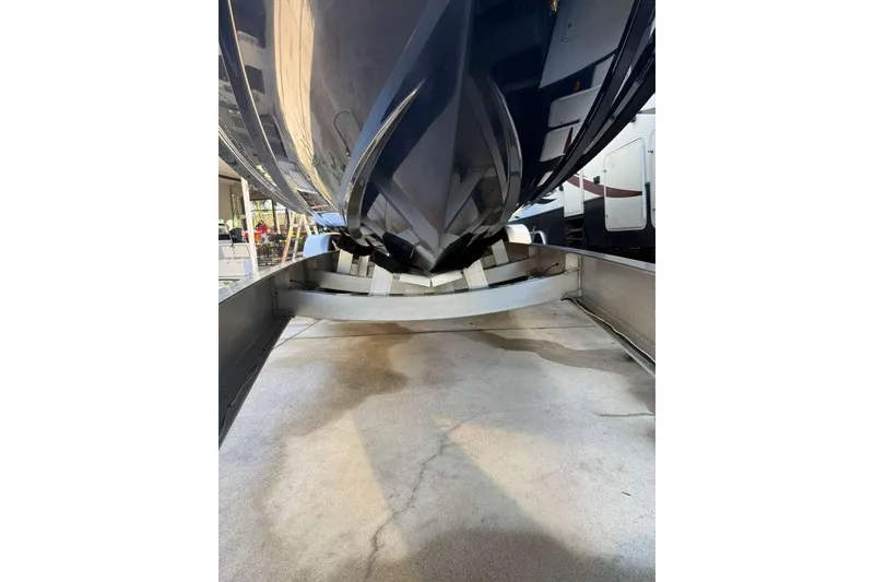 Slide: The Image of 2022 Contender 35 ST boat hull on trailer, close-up view. - 7