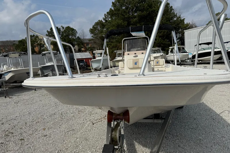 Slide: The Image of 2017 Carolina Skiff 218 DLV boat on trailer, parked outdoors. - 15