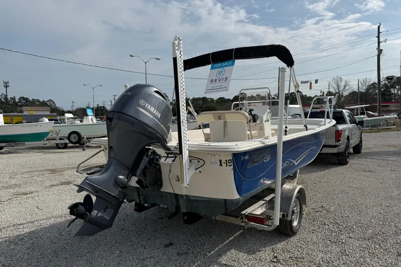 Slide: The Image of 2017 Carolina Skiff 218 DLV boat with Yamaha motor on trailer, for sale. - 5
