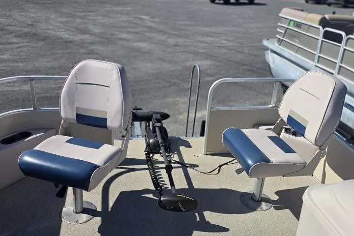 Slide: The Image of 2011 Weeres Cadet Fish 160 boat with two swivel seats and trolling motor. - 11