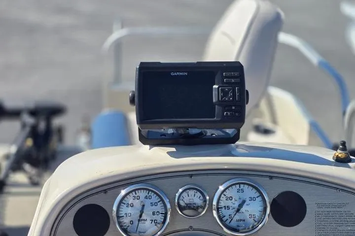 Slide: The Image of Dashboard of 2011 Weeres Cadet Fish 160 with Garmin device and gauges. - 14