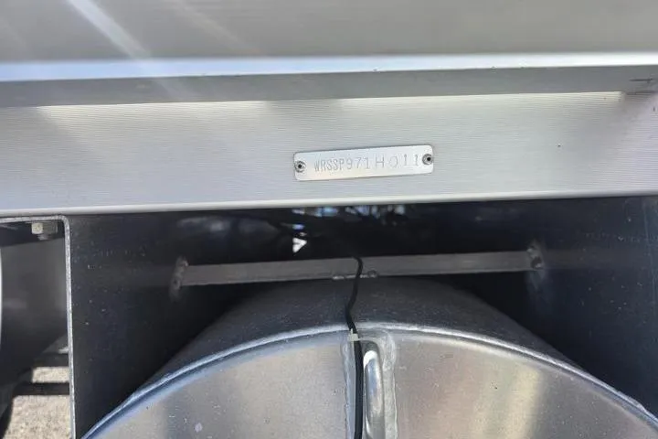 Slide: The Image of 2011 Weeres Cadet Fish 160 pontoon boat with visible identification plate. - 16