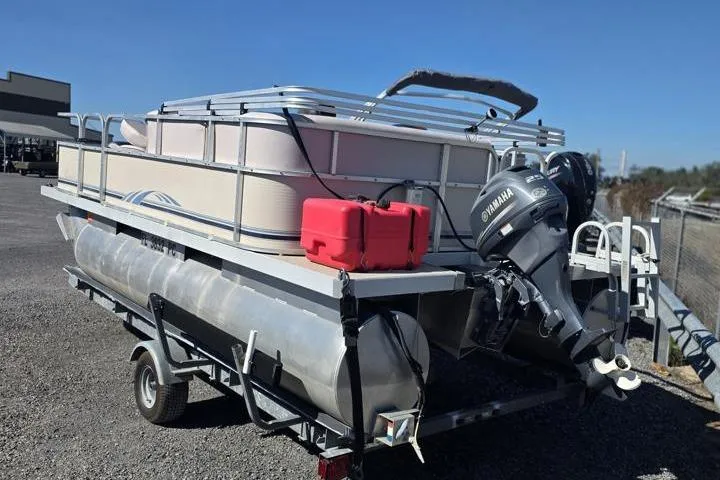 Slide: The Image of 2011 Weeres Cadet Fish 160 pontoon boat on trailer with Yamaha outboard motor. - 4