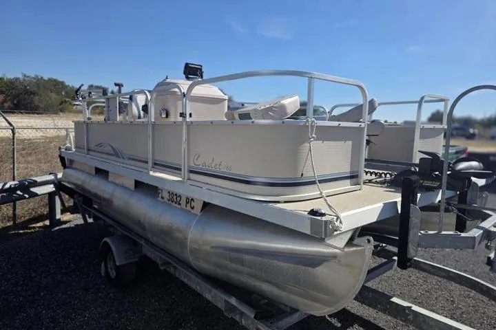 Slide: The Image of 2011 Weeres Cadet Fish 160 pontoon boat on trailer, side view. - 8