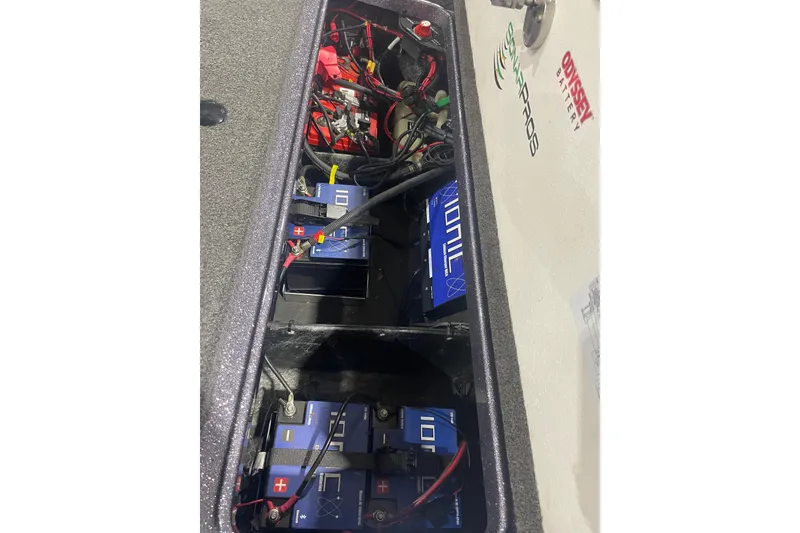 Slide: The Image of 2018 Ranger Z521L boat battery compartment with Ionic and Odyssey batteries. - 10