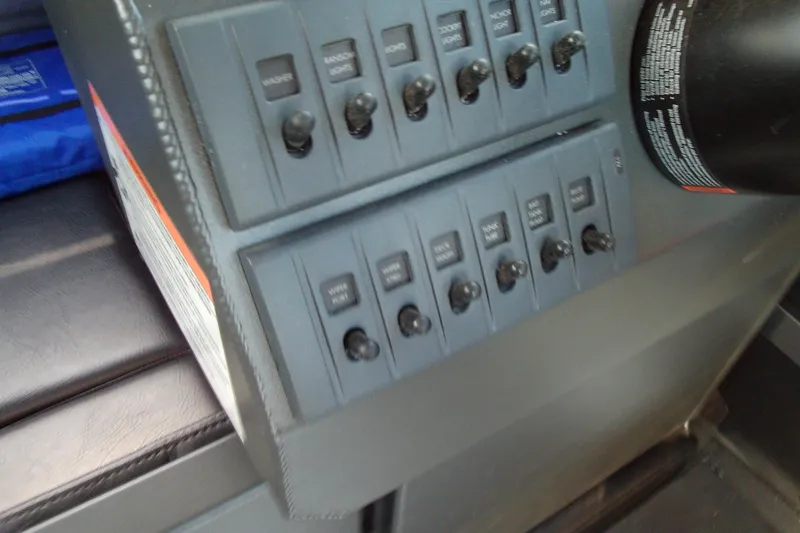 Slide: The Image of Control panel of 2025 Stabicraft 2250 Ultra Centrecab with labeled switches. - 11