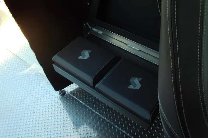 Slide: The Image of Interior storage compartment of 2025 Stabicraft 2250 Ultra Centrecab with logo detail. - 13