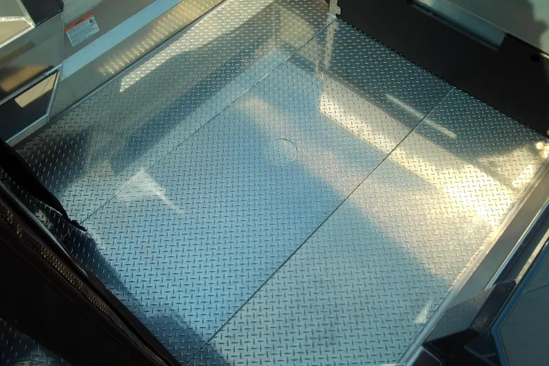 Slide: The Image of 2025 Stabicraft 2250 Ultra Centrecab interior with diamond plate flooring. - 23